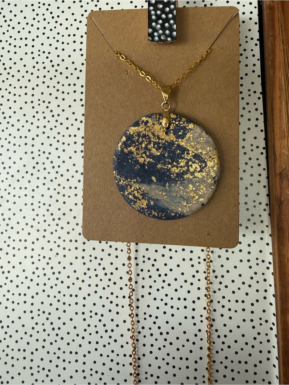 Round Navy Pendant Necklace with Gold Leaf Accents